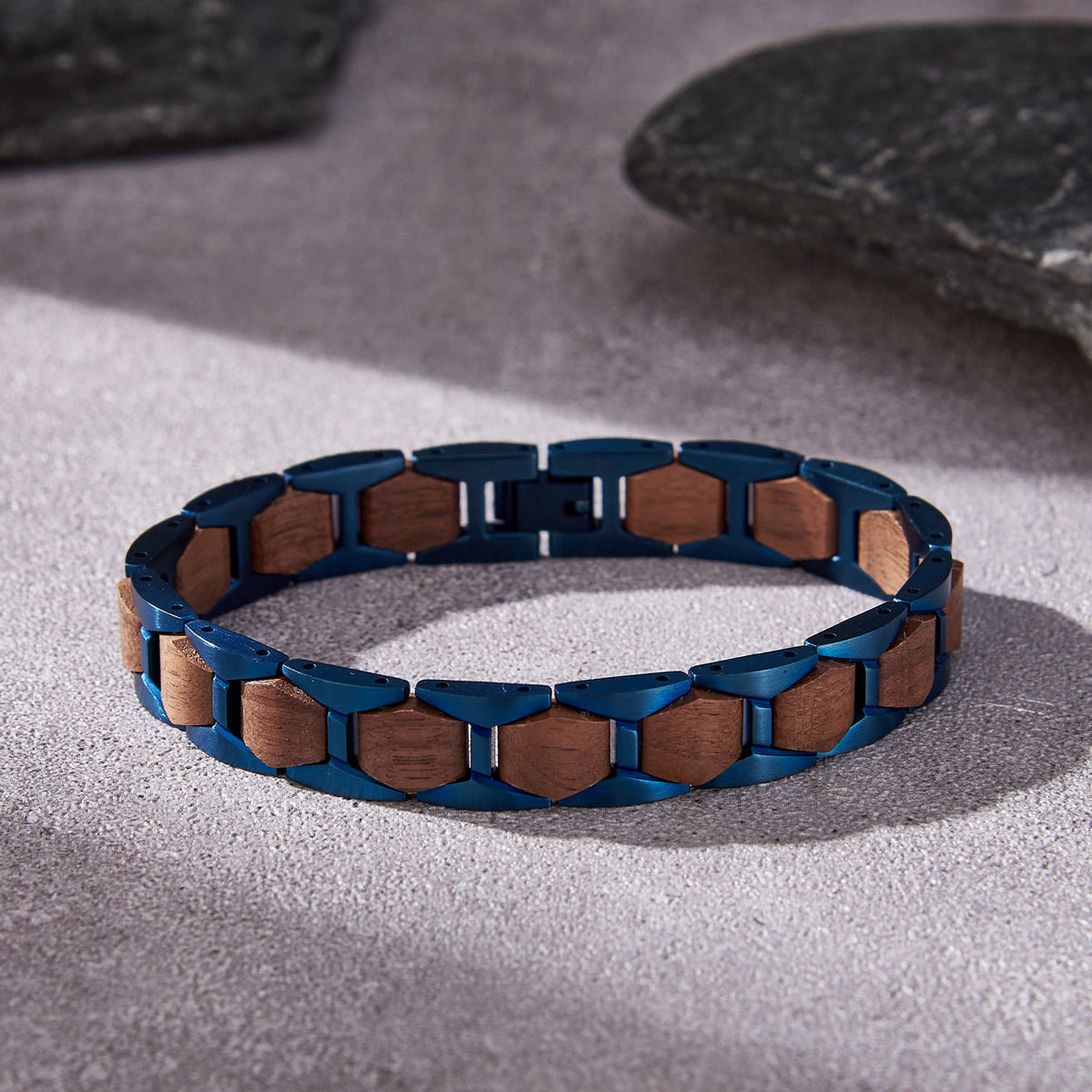 Men's bracelet crafted from blue stainless steel and walnut wood, featuring a stylish link design, ideal for men's fashion and accessories.