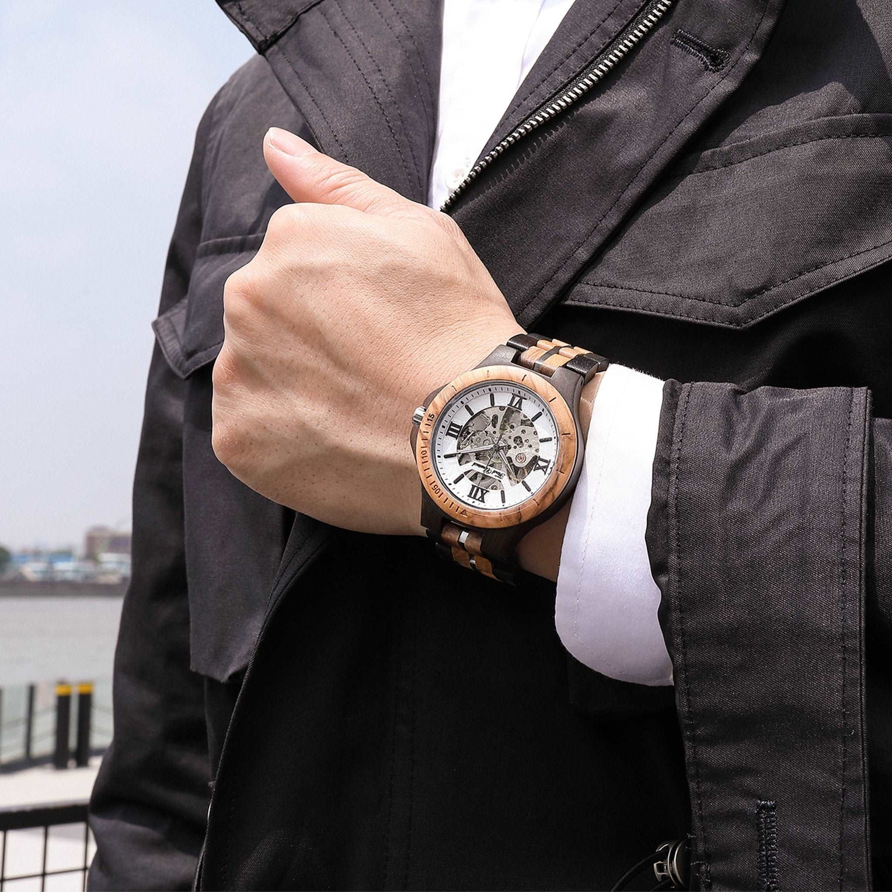 wood watch men wooden watch automatic mechanical watch ebony olive wearing on a man wrist