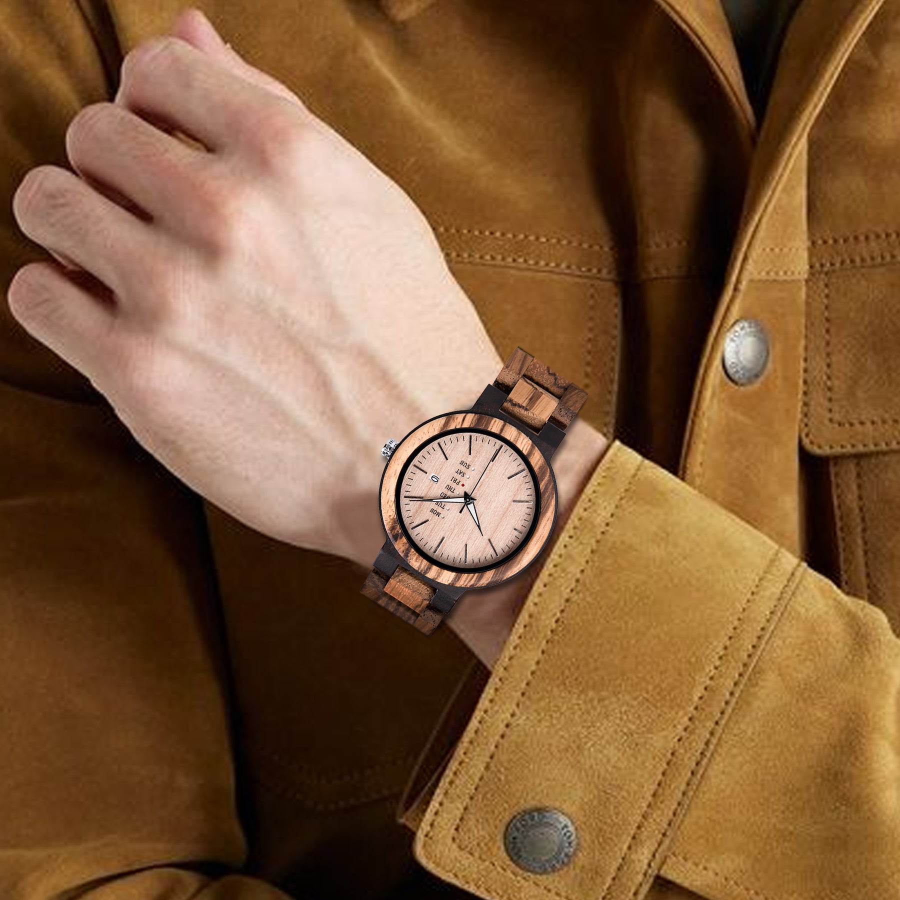 A man wearing an ebony and zebrawood quartz watch with maple face