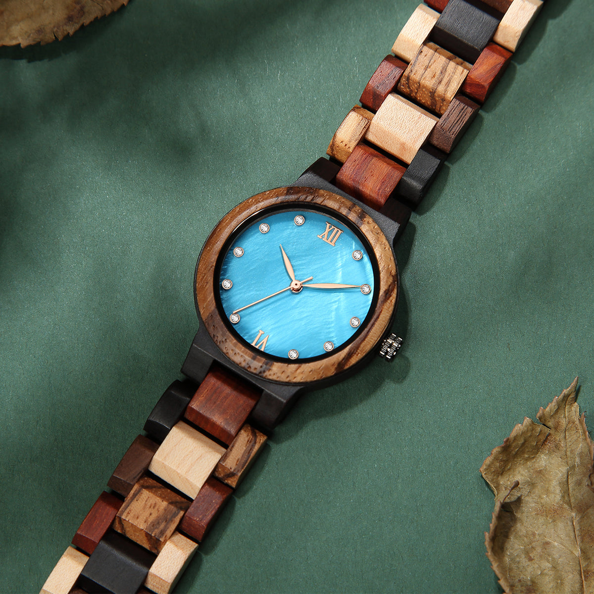 wood watch women wooden watch minimal watch mixed wood lying on table