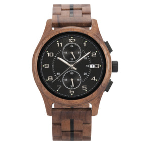 A men's chronograph watch featuring a brown wooden case and band, a black dial with silver-tone numerals, hands, sub-dials, and a date display, isolated on a white background.