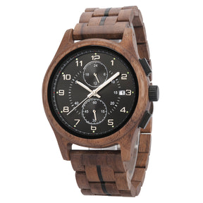 A men's chronograph watch with a brown wooden case and band, featuring a black dial, luminous markers, silver-tone hands, sub-dials, and a date display, isolated on a white background.
