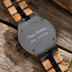 A detailed view of the back case of a men's wooden chronograph watch with gold and black accents, displayed on a wooden surface to emphasize its craftsmanship and rugged design.