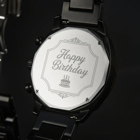 A detailed view of the back case of a men's wooden chronograph watch with a black dial, showcasing its metallic finish and structural design elements.