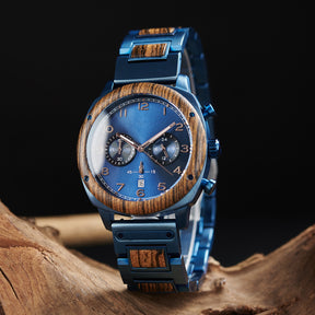 A stylish men's wooden chronograph watch with a blue dial and wooden bezel, showcased on natural wood to highlight its sophisticated and rugged design.