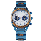 A sophisticated men's wooden chronograph watch with a white dial and blue accents, presented against a white background to highlight its refined and classic design.