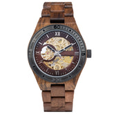 A men's automatic mechanical watch crafted from walnut wood and black stainless steel, featuring a skeleton dial that reveals intricate movement, displayed against a white background.