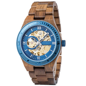 A men's automatic mechanical watch crafted from walnut wood and blue stainless steel, showcasing a skeleton dial with visible intricate movement, presented at an angle against a white background.