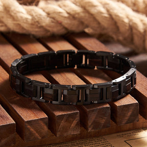 Men's bracelet made of black stainless steel and ebony wood, featuring a tough design, ideal for men's fashion and accessories.