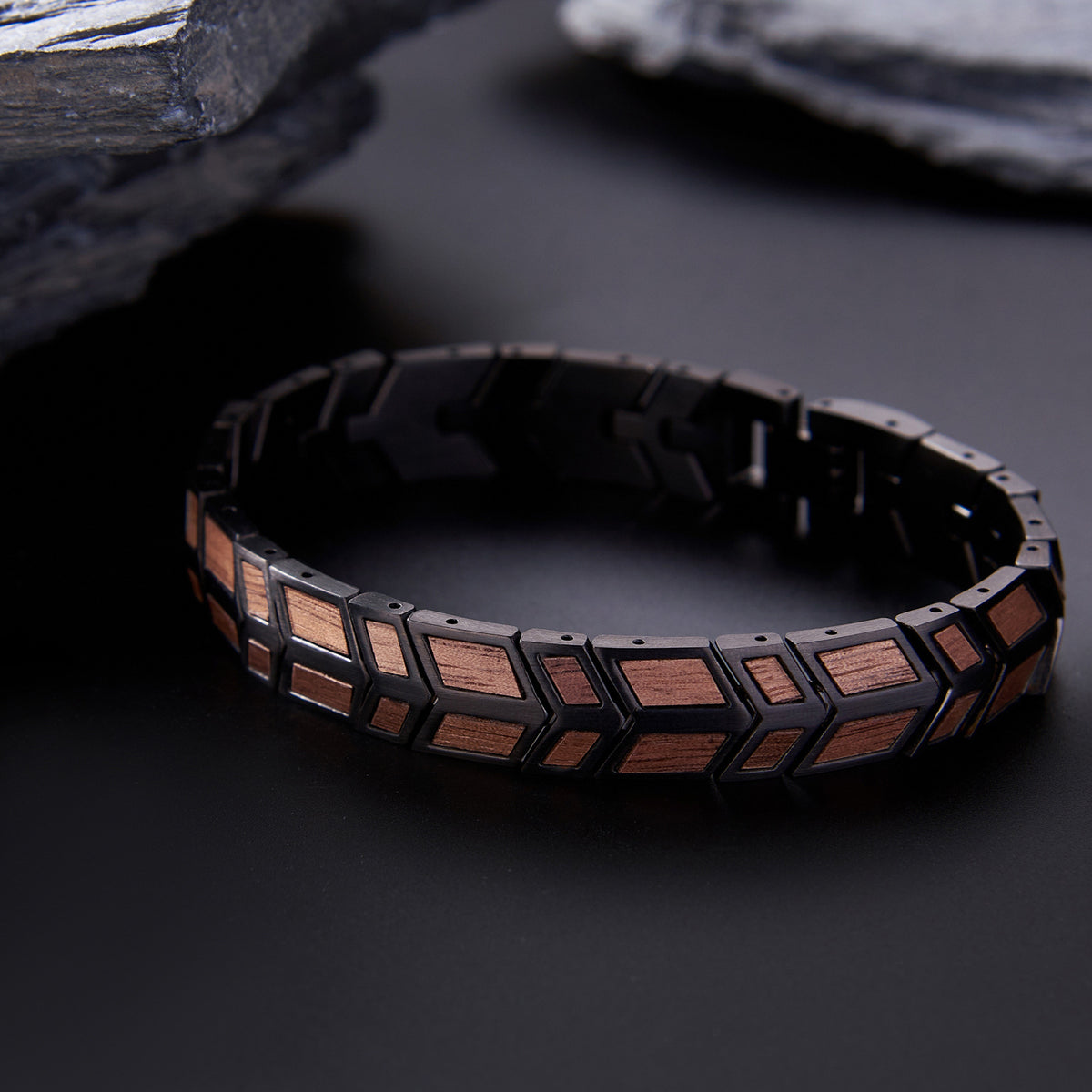 Men's bracelet crafted from black stainless steel and walnut wood, with a geometric design. A stylish accessory for men, suitable for daily wear and gifting.