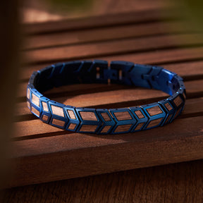 Men's bracelet made of blue stainless steel and walnut wood, featuring a unique geometric design. A stylish accessory for men, perfect for casual and formal looks