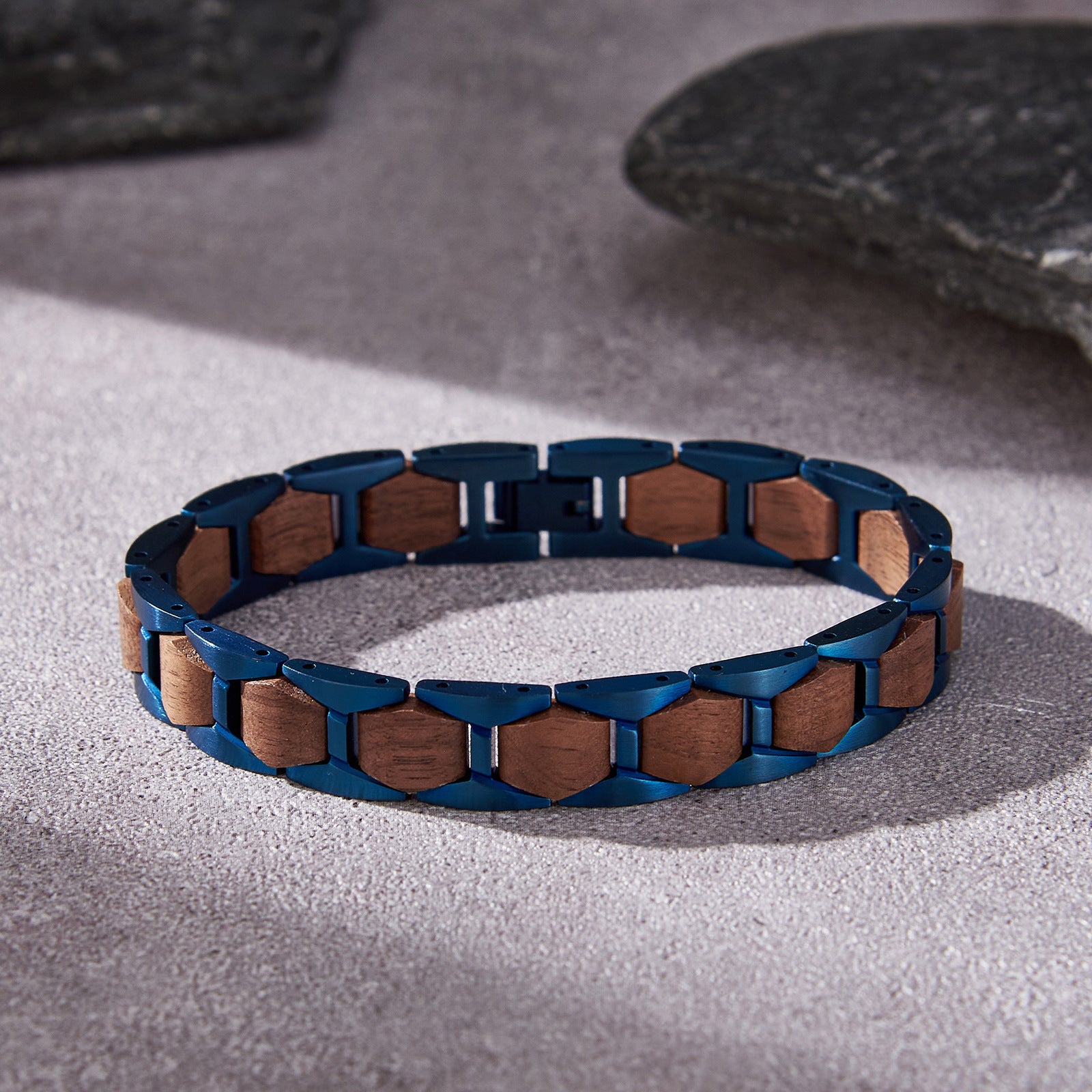 Men's bracelet crafted from blue stainless steel and walnut wood, featuring a stylish link design, ideal for men's fashion and accessories.
