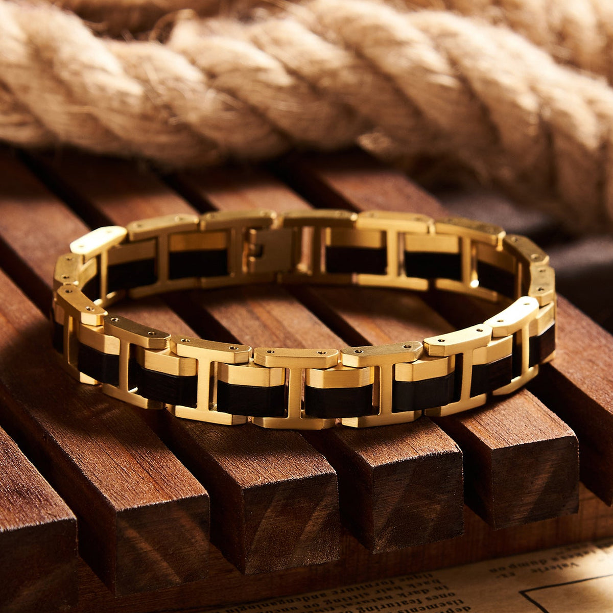 Men's bracelet crafted from gold stainless steel and ebony wood, featuring a premium design, ideal for stylish men's jewelry collections.