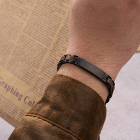 Men's bracelet made of gunmetal stainless steel and walnut wood, worn on wrist, showcasing a rugged and stylish look, perfect accessory for men's fashion.