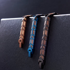 Collection of men's bracelets made from stainless steel (rose gold, blue, black) and wood. Stylish, geometric - designed accessories for men, ideal for fashion and gifting.