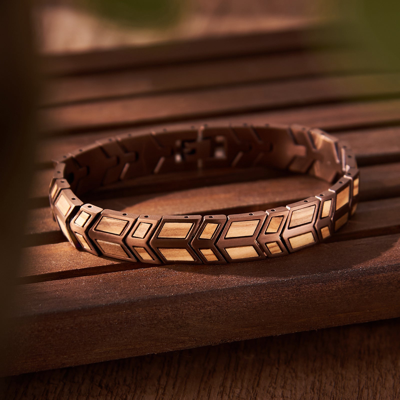Men's bracelet made of rose gold stainless steel and olive wood, featuring a unique geometric design. Stylish accessory for men, perfect for everyday wear and gifting.