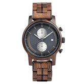 A sophisticated men's wooden chronograph watch featuring a dark gray dial, multiple sub-dials, a date function, and a brown wood band, presented against a white background to highlight its elegant and refined design.