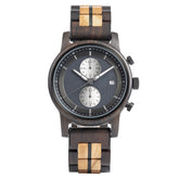 A sophisticated men's wooden chronograph watch featuring a two-tone wood band, dark gray dial, multiple sub-dials, and a date function, presented against a white background to highlight its elegant and refined design.