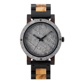 A rugged men's watch featuring a gray stone dial, two-tone wooden band with dark and light wood accents, presented against a white background to highlight its masculine and natural aesthetic.