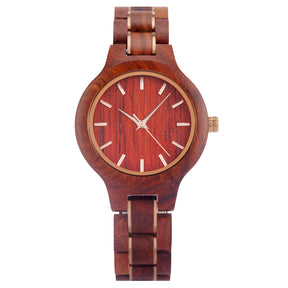 A sophisticated women's rosewood watch with gold-tone accents, presented against a white background to highlight its natural wood grain and elegant design.