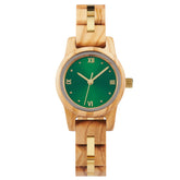 A sophisticated women's wooden watch with a green dial, gold accents, and Roman numerals, presented against a white background to highlight its refined and elegant design.