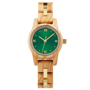 A sophisticated women's wooden watch with a green dial, gold accents, and Roman numerals, presented against a white background to highlight its refined and elegant design.