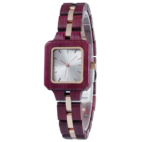 A refined women's wooden watch with a white dial and rose gold accents, shown in side view against a white background to highlight its craftsmanship and elegant design.
