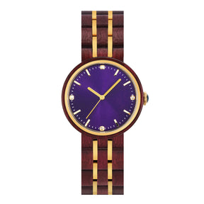 An elegant women's wooden watch featuring a purple dial, gold-tone accents, diamond-like details, and a two-tone wood and metal band, presented against a white background to highlight its luxurious and sophisticated design.