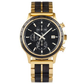 A chronograph watch with a combination of gold metal and dark wood bracelet, featuring a black dial with multiple sub-dials, 24-hour markers on the bezel, and a date window, presented against a white background.