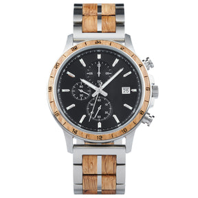 A chronograph watch with a combination of silver metal and light wood bracelet, featuring a black dial with multiple sub-dials, 24-hour markers on the bezel, and a date window, presented against a white background.