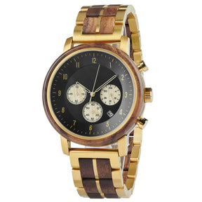 A chronograph watch with a combination of wooden and gold metal bracelet, featuring a black dial with gold accents, beige chronograph sub-dials, numerical hour markers, and a date window, shown from a side angle against a white background.