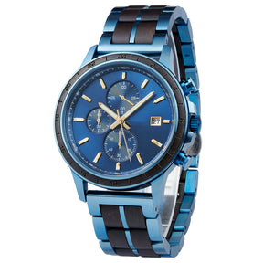 A chronograph watch with a combination of blue metal and dark wood bracelet, featuring a blue dial with multiple sub-dials, 24-hour markers on the bezel, and a date window, shown from a side angle against a white background.