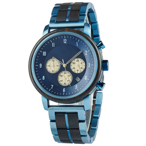 A chronograph watch with a combination of wooden and blue metal bracelet, featuring a blue dial with beige chronograph sub-dials, numerical hour markers, and a date window, shown from a side angle against a white background.