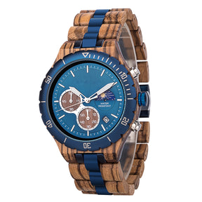 A multifunction watch with a combination of wooden and blue metal bracelet, featuring a blue dial with chronograph sub-dials, moon phase display, water-resistant label, and date window, shown from a side angle against a white background.