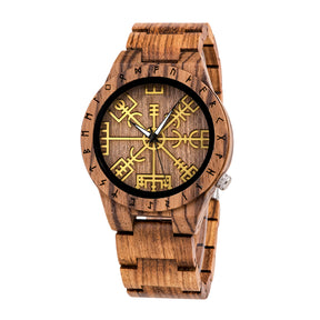 A side view of a brown wooden wristwatch with golden Viking symbols and runes on the dial, displayed against a plain white background.