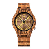 A brown wooden wristwatch featuring golden Viking symbols and runes on the dial, displayed against a plain white background.