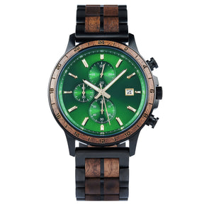 A chronograph watch with a combination of black metal and light wood bracelet, featuring a green dial with multiple sub-dials, 24-hour markers on the bezel, and a date window, presented against a white background.
