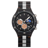 A multifunction watch featuring a combination of wooden and metal bracelet, a black dial with chronograph sub-dials, moon phase display, water-resistant label, and a date window, presented against a white background.