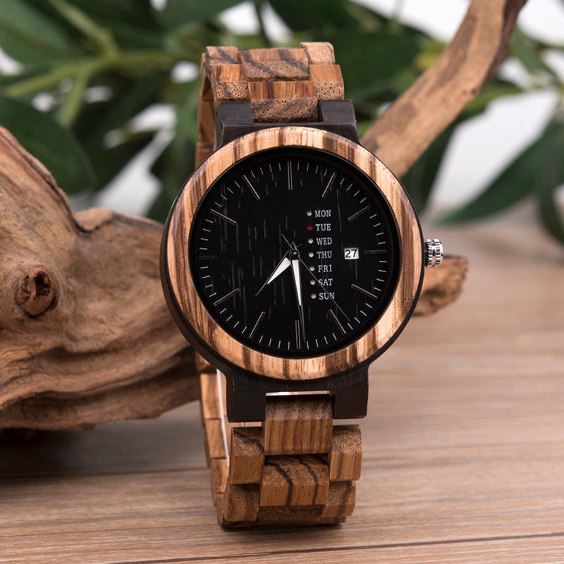 Ebony and zebrawood strap men wooden watch standing on wooden table
