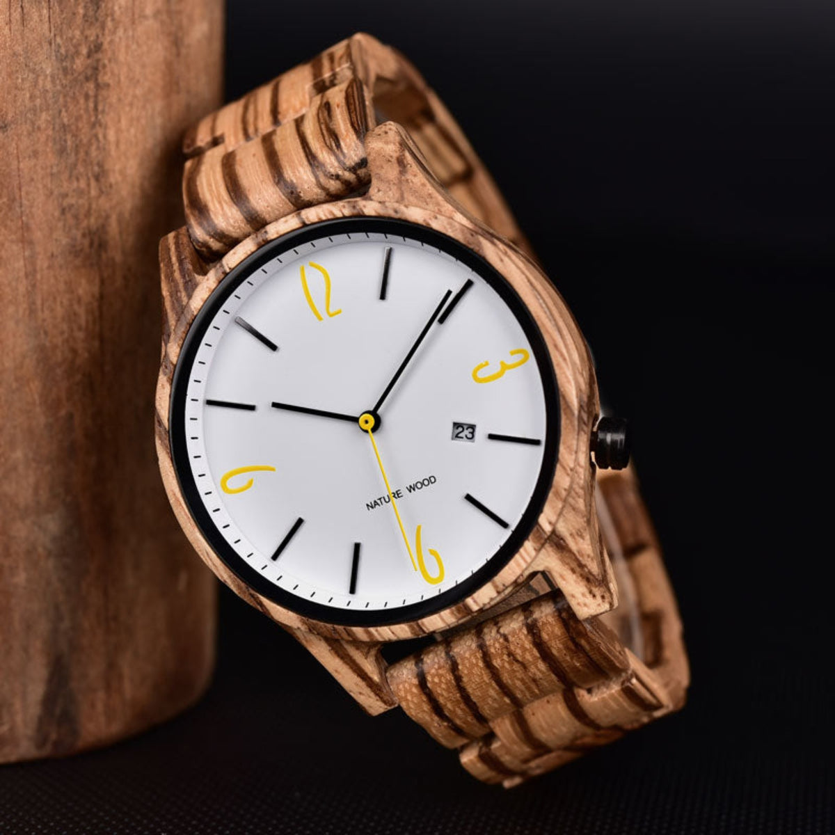 The zebrawood men wooden watch with white face on the table